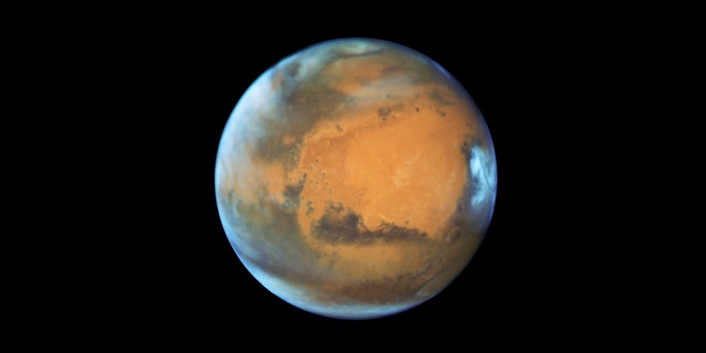 Foto van Mars gemaakt door ruimtetelescoop Hubble. 