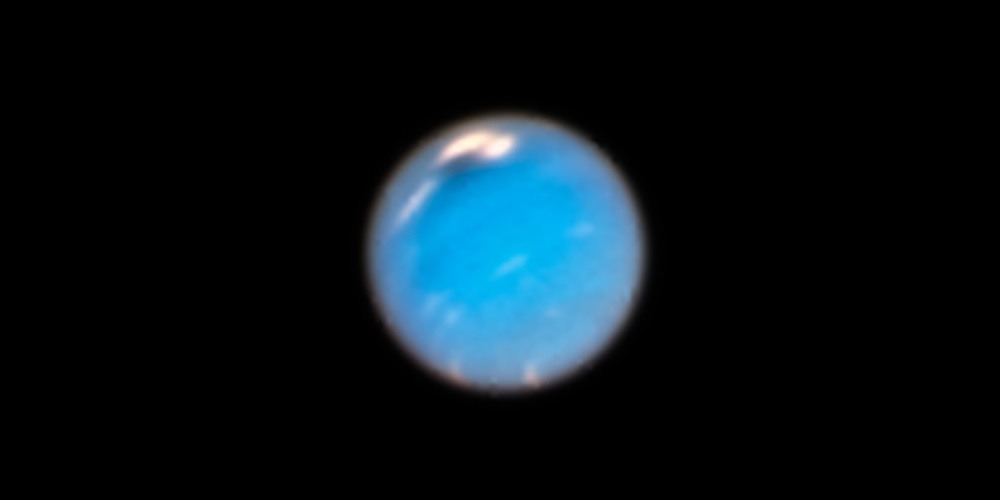 De nieuwe donkere vlak in de atmosfeer van Neptunus.